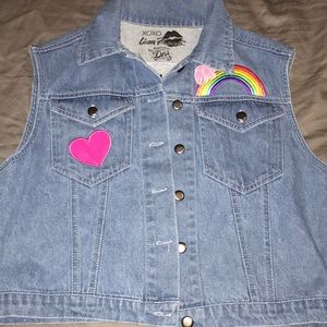 Lisa Frank vest. New without tags. Size medium